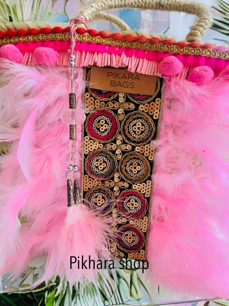 Capazo boho plumas rosa