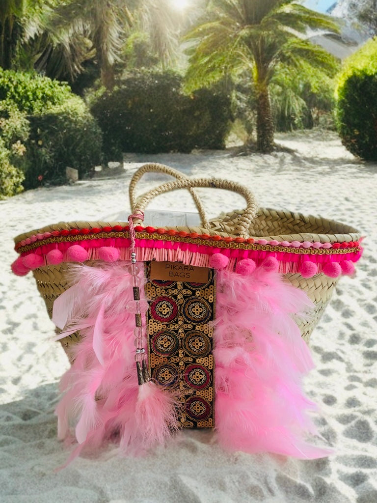 Capazo boho plumas rosa
