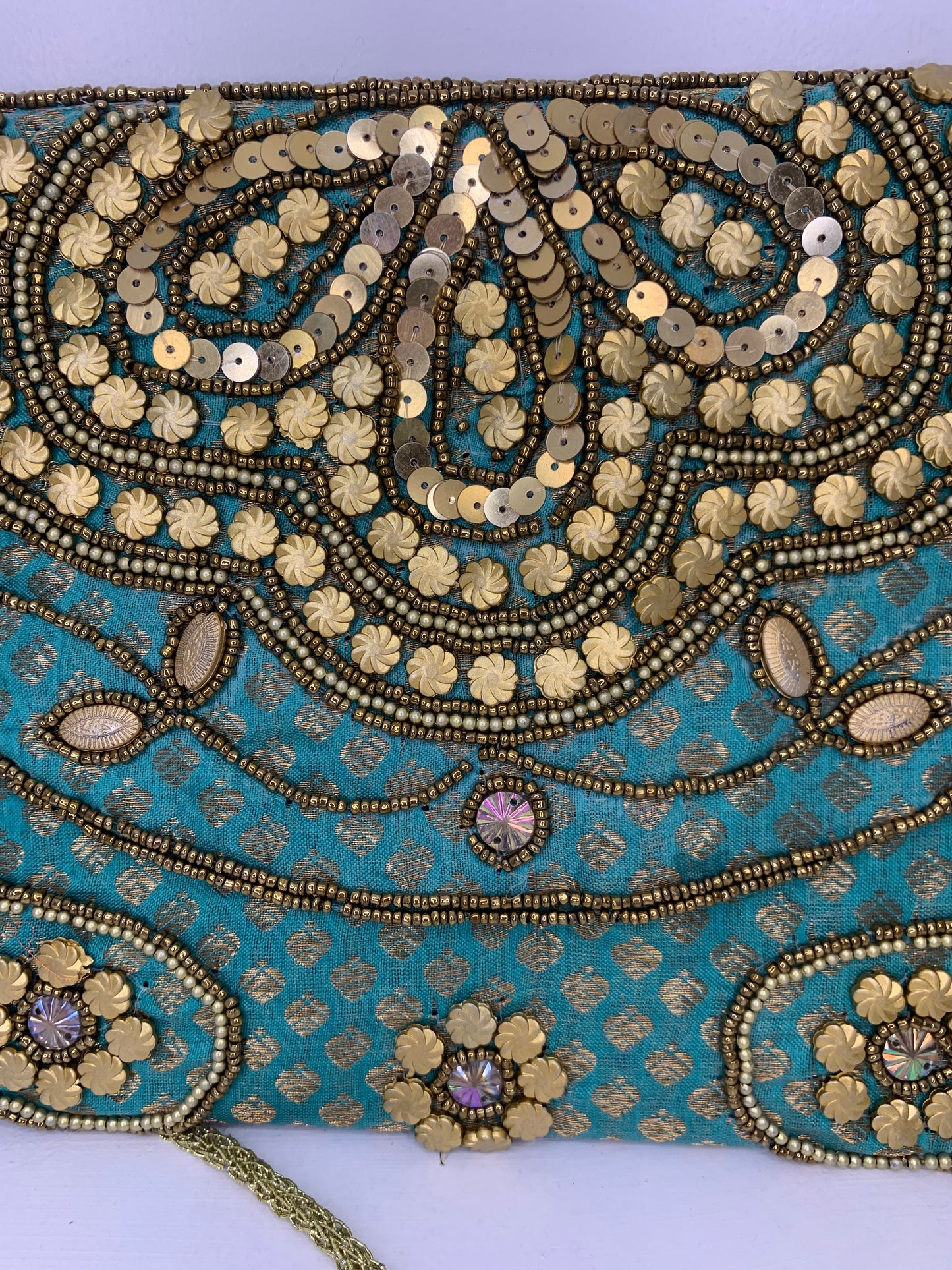 Bolso étnico turquesa.