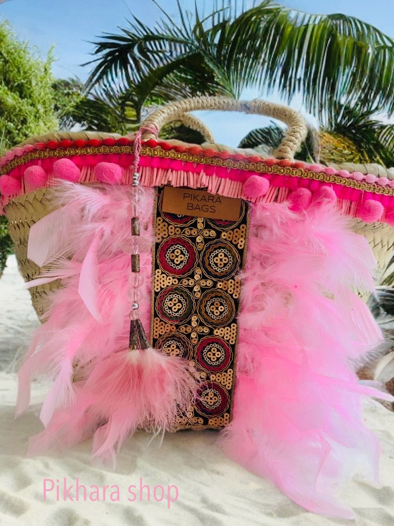 Capazo boho plumas rosa
