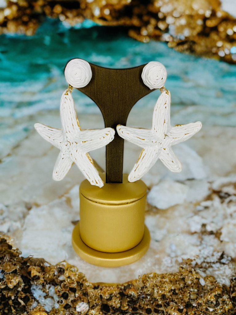 Pendientes estrella de mar blancos.