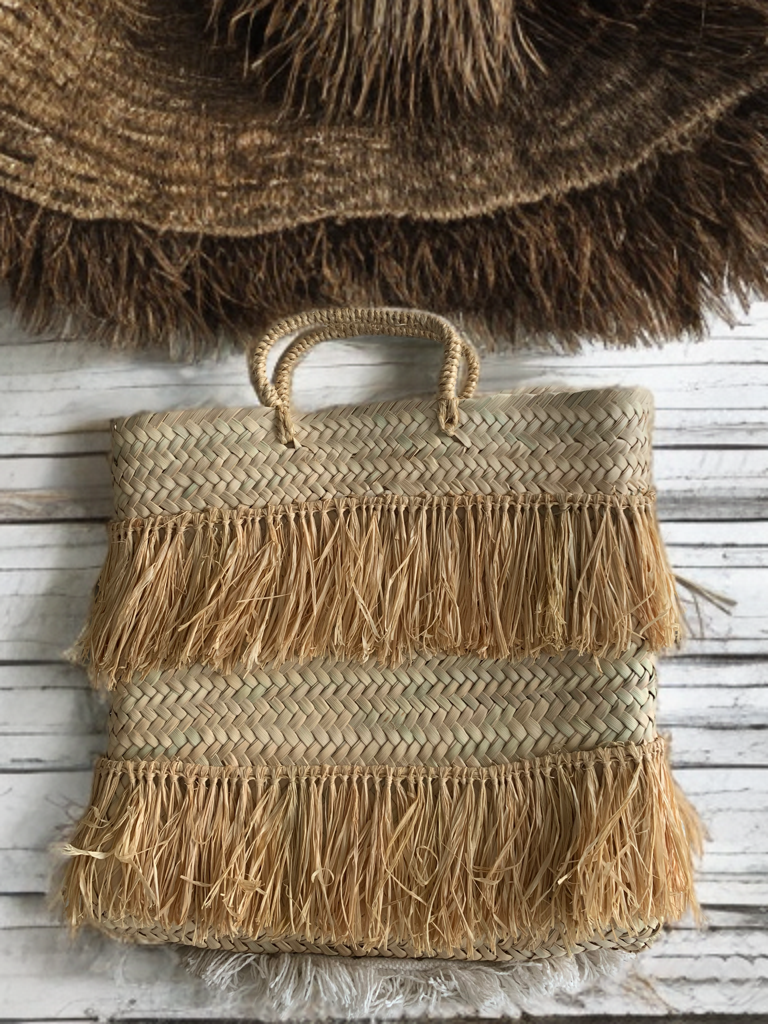 Bolso de mano  fleco natural.